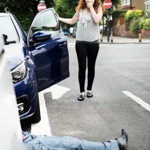 person-lying-on-the-ground-after-a-car-accident-2023-11-27-05-32-04-utc (1)