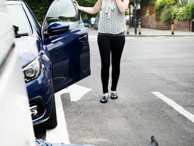 person-lying-on-the-ground-after-a-car-accident-2023-11-27-05-32-04-utc (1)